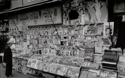 A historic Manhattan newsstand covered in magazines